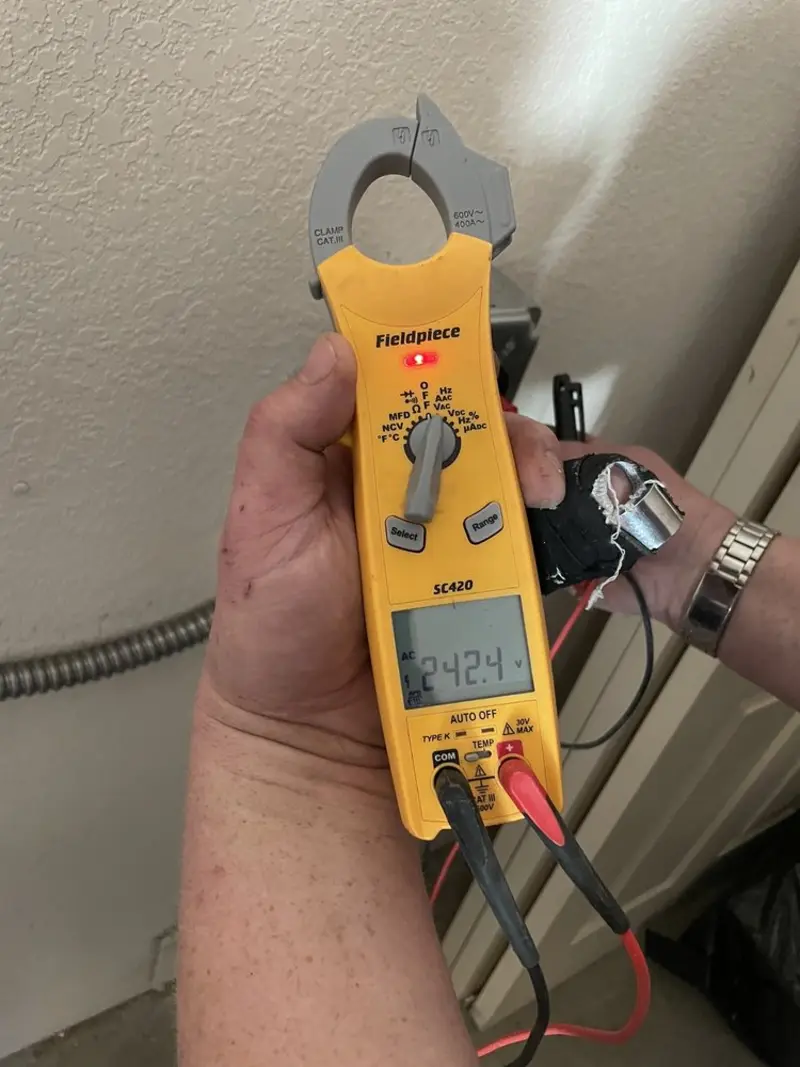 Voltage testing with clamp meter during Circuit Breaker Repair in Enfield